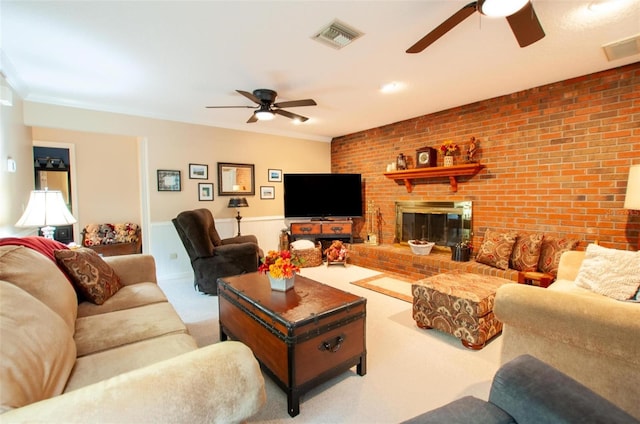 3990 NE Ashley Ter, Arcadia, FL 34266 - living area with a ceiling fan, carpet floors, brick wall, ornamental molding, and a fireplace