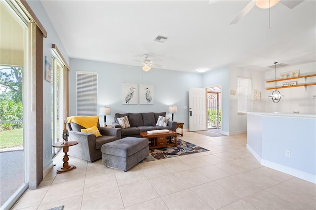 3820 Cobia Villas Ct, Punta Gorda, FL 33955 - living area featuring ceiling fan and light tile patterned floors