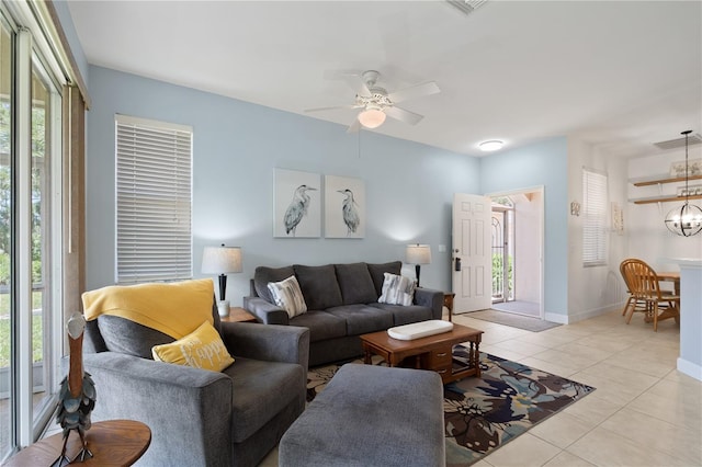 3820 Cobia Villas Ct, Punta Gorda, FL 33955 - living area with light tile patterned floors and a ceiling fan