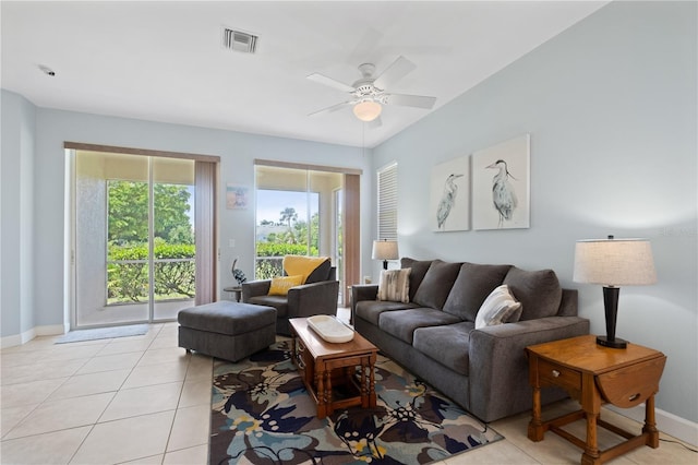 3820 Cobia Villas Ct, Punta Gorda, FL 33955 - living area with a ceiling fan and light tile patterned flooring