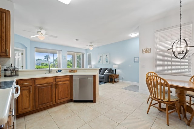 3820 Cobia Villas Ct, Punta Gorda, FL 33955 - kitchen with dishwasher, ceiling fan, white range, and a peninsula