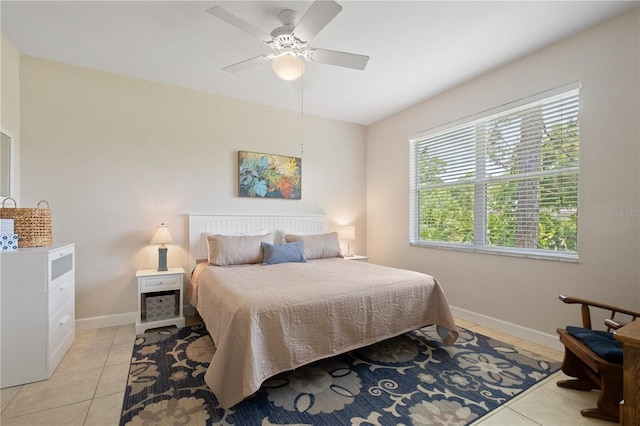 3820 Cobia Villas Ct, Punta Gorda, FL 33955 - bedroom featuring light tile patterned floors and a ceiling fan
