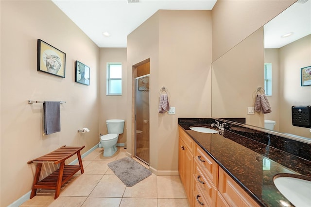 2697 Parrot St, North Port, FL 34286 - bathroom featuring double vanity, a stall shower, and tile patterned flooring
