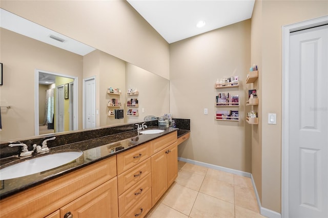 2697 Parrot St, North Port, FL 34286 - full bath featuring double vanity and tile patterned floors