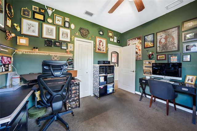 2697 Parrot St, North Port, FL 34286 - office area with ceiling fan and dark carpet