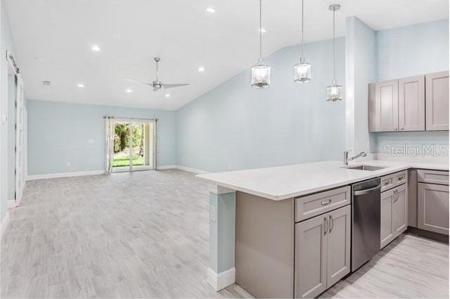 9471-9473 Agate St, Port Charlotte, FL 33981 - kitchen with dishwasher, gray cabinetry, vaulted ceiling, ceiling fan, and light wood finished floors