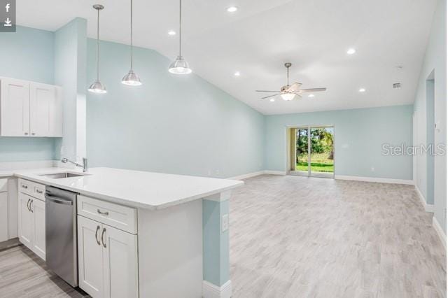 9471-9473 Agate St, Port Charlotte, FL 33981 - kitchen with dishwasher, light wood finished floors, light countertops, a ceiling fan, and recessed lighting