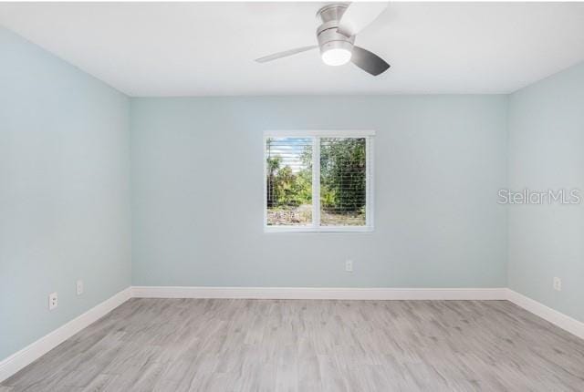 9471-9473 Agate St, Port Charlotte, FL 33981 - spare room with light wood-style floors and a ceiling fan