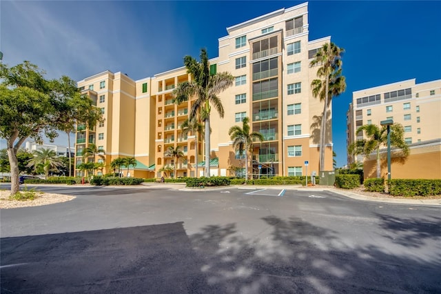 2090 Matecumbe Key Rd Unit 1202, Punta Gorda, FL 33955 - view of apartment building / complex with uncovered parking