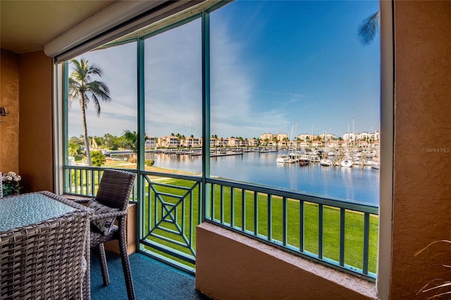2090 Matecumbe Key Rd Unit 1202, Punta Gorda, FL 33955 - sunroom with a water view