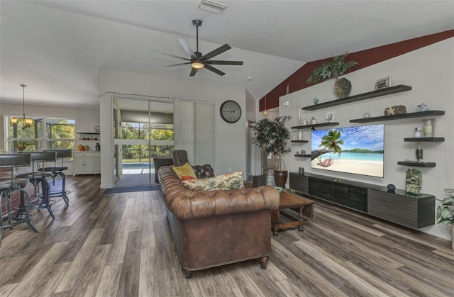1445 Gauguin Rd, North Port, FL 34288 - living area featuring wood finished floors, ceiling fan, and lofted ceiling
