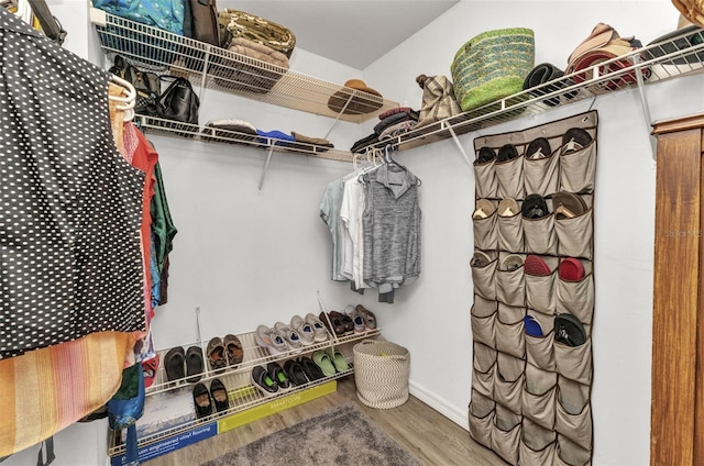 1445 Gauguin Rd, North Port, FL 34288 - spacious closet featuring wood finished floors