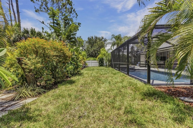 1445 Gauguin Rd, North Port, FL 34288 - fenced backyard with an outdoor pool and a lanai
