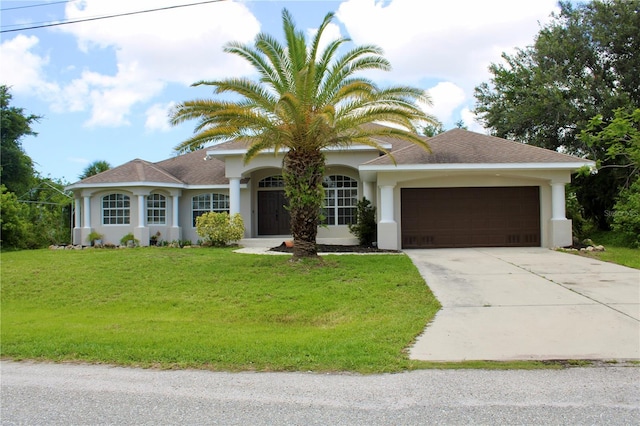 8039 Agate St, Port Charlotte, FL 33981 - single story home with a garage, concrete driveway, stucco siding, a front lawn, and a shingled roof