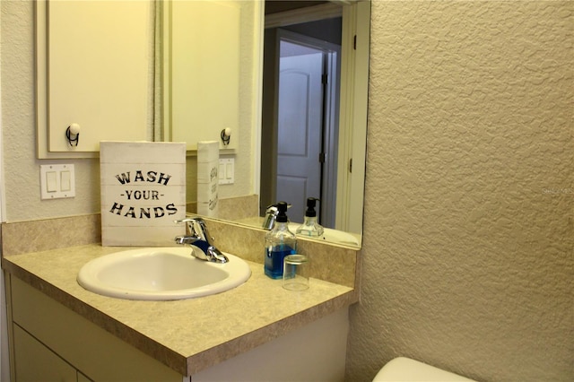 8039 Agate St, Port Charlotte, FL 33981 - half bathroom with vanity and a textured wall