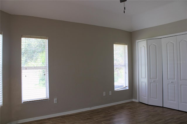 8039 Agate St, Port Charlotte, FL 33981 - unfurnished bedroom with wood finished floors and a closet