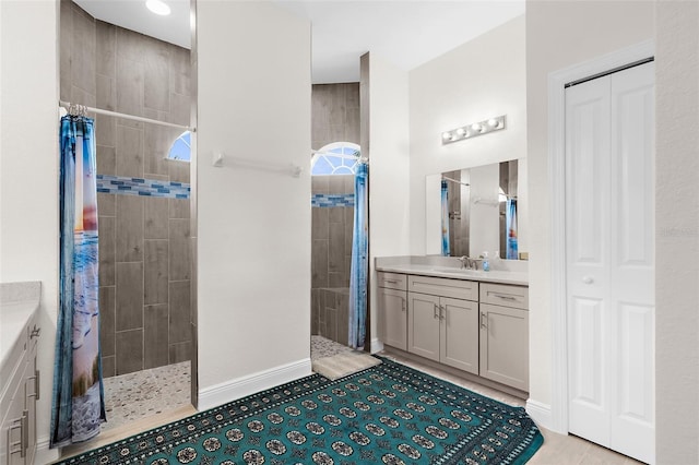2453 Harbour Dr, Punta Gorda, FL 33983 - bathroom with vanity, a walk in shower, a closet, and tile patterned flooring