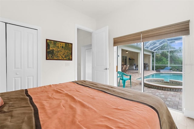 2453 Harbour Dr, Punta Gorda, FL 33983 - tiled bedroom with a sunroom, access to exterior, and a closet