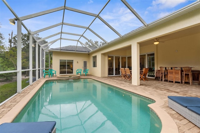 2453 Harbour Dr, Punta Gorda, FL 33983 - view of pool featuring a patio, a pool with connected hot tub, a ceiling fan, and a lanai
