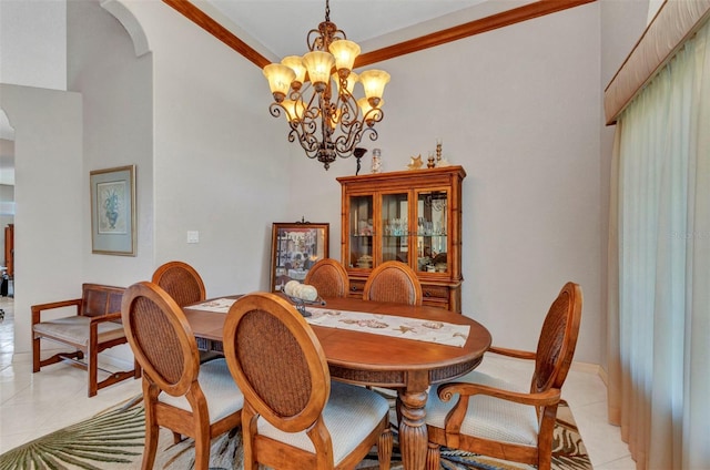 771 Rotonda Cir, Rotonda West, FL 33947 - dining room featuring arched walkways, light tile patterned floors, a chandelier, and ornamental molding