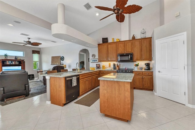 771 Rotonda Cir, Rotonda West, FL 33947 - kitchen featuring black appliances, a ceiling fan, open floor plan, brown cabinets, and a peninsula