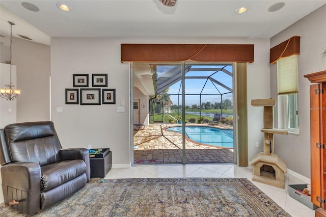 771 Rotonda Cir, Rotonda West, FL 33947 - doorway featuring a sunroom, tile patterned floors, a chandelier, and recessed lighting
