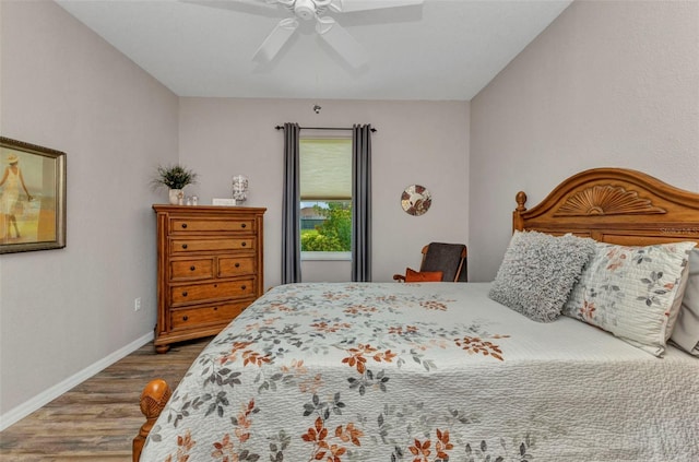 771 Rotonda Cir, Rotonda West, FL 33947 - bedroom with wood finished floors and a ceiling fan