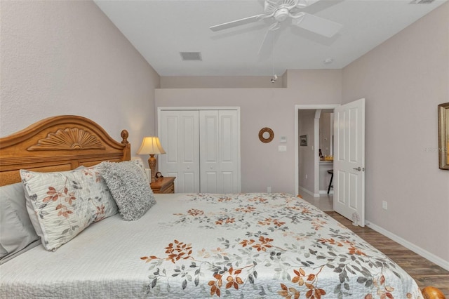 771 Rotonda Cir, Rotonda West, FL 33947 - bedroom featuring wood finished floors, a closet, and a ceiling fan