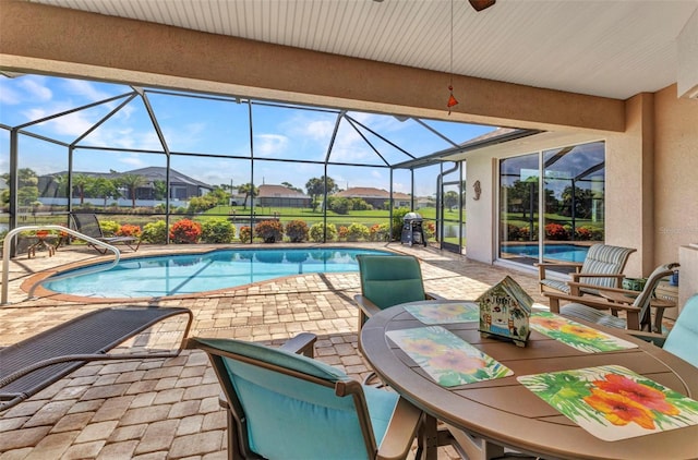 771 Rotonda Cir, Rotonda West, FL 33947 - swimming pool with a patio, a lanai, and grilling area