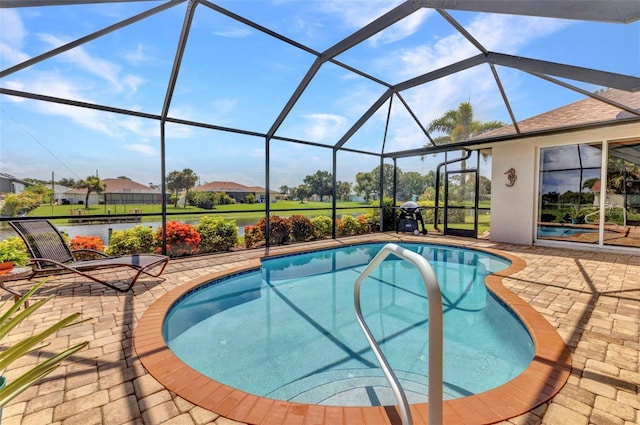 771 Rotonda Cir, Rotonda West, FL 33947 - swimming pool featuring a patio area and glass enclosure