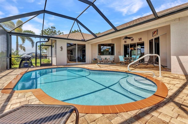 771 Rotonda Cir, Rotonda West, FL 33947 - outdoor pool with a patio, a ceiling fan, and glass enclosure