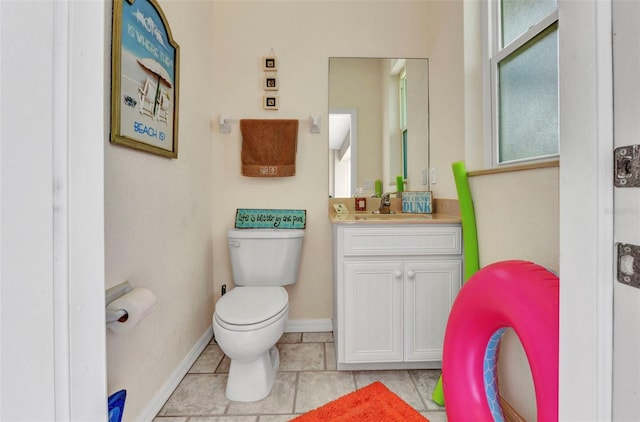 771 Rotonda Cir, Rotonda West, FL 33947 - bathroom with vanity and tile patterned flooring