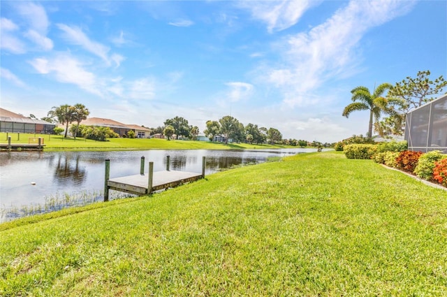 771 Rotonda Cir, Rotonda West, FL 33947 - view of green lawn featuring a water view and a boat dock