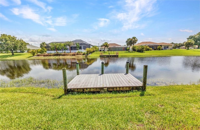 771 Rotonda Cir, Rotonda West, FL 33947 - dock area with a water view, a lawn, and a residential view