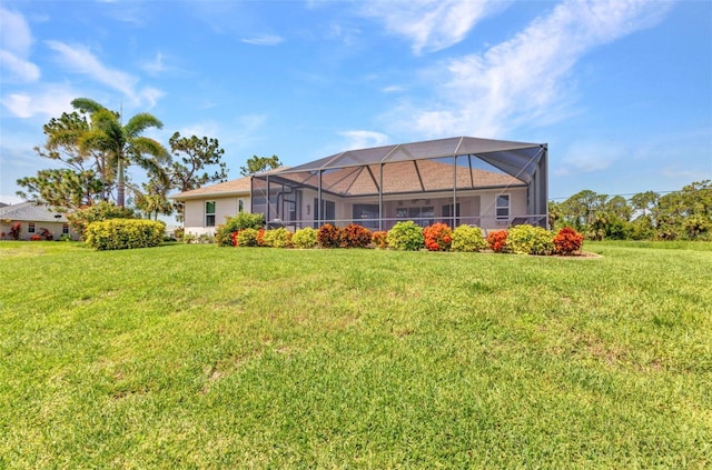 771 Rotonda Cir, Rotonda West, FL 33947 - back of house with a yard and glass enclosure