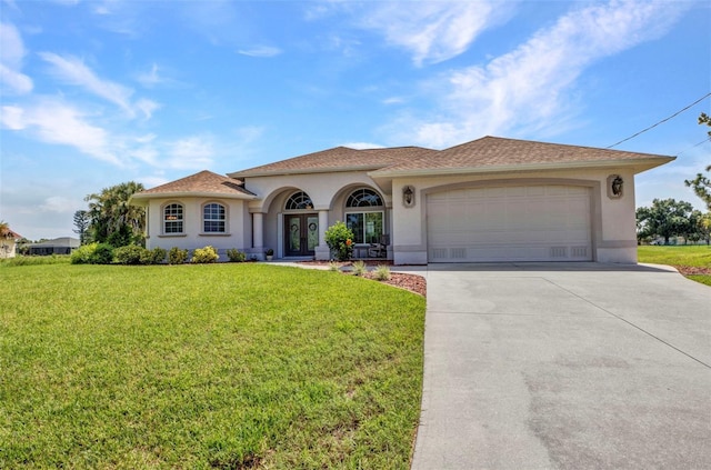 771 Rotonda Cir, Rotonda West, FL 33947 - mediterranean / spanish home with stucco siding, driveway, a front yard, and a garage