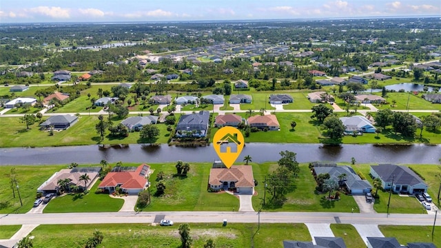 771 Rotonda Cir, Rotonda West, FL 33947 - aerial view of residential area with a nearby body of water
