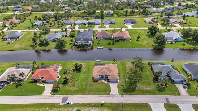 771 Rotonda Cir, Rotonda West, FL 33947 - aerial view of residential area featuring a large body of water