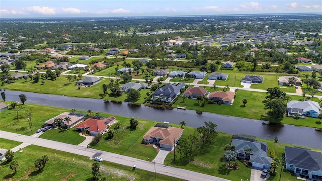 771 Rotonda Cir, Rotonda West, FL 33947 - aerial overview of property's location featuring a nearby body of water and nearby suburban area