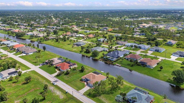 771 Rotonda Cir, Rotonda West, FL 33947 - aerial view of property and surrounding area with nearby suburban area and a nearby body of water