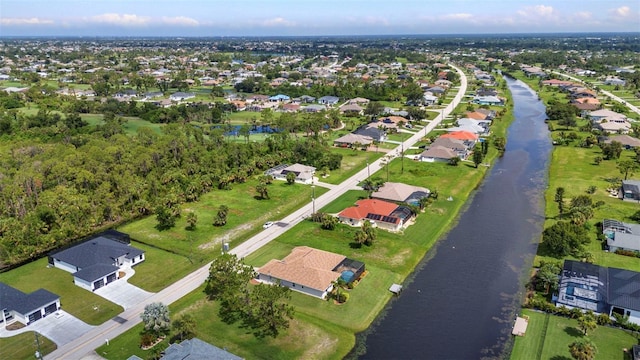 771 Rotonda Cir, Rotonda West, FL 33947 - aerial view of property and surrounding area with nearby suburban area