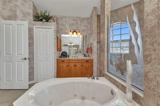 771 Rotonda Cir, Rotonda West, FL 33947 - bathroom featuring vanity and a jetted tub