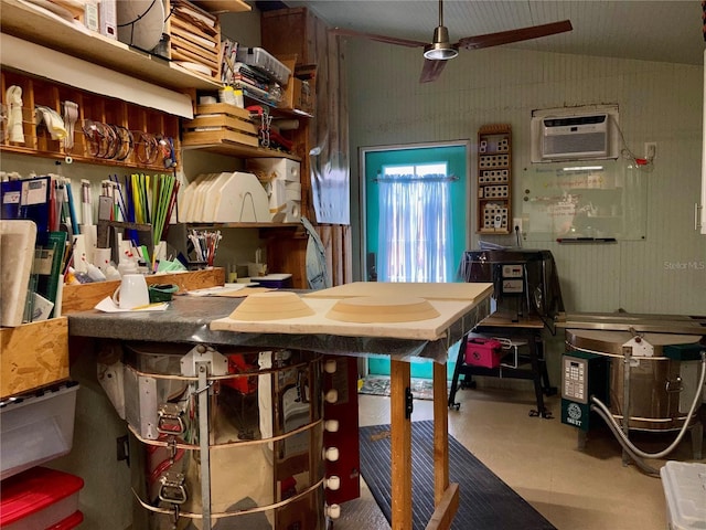 232 Darst Ave, Punta Gorda, FL 33950 - interior space with vaulted ceiling, a wall mounted air conditioner, ceiling fan, concrete floors, and open shelves
