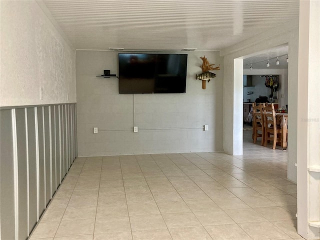 232 Darst Ave, Punta Gorda, FL 33950 - spare room with light tile patterned flooring and rail lighting
