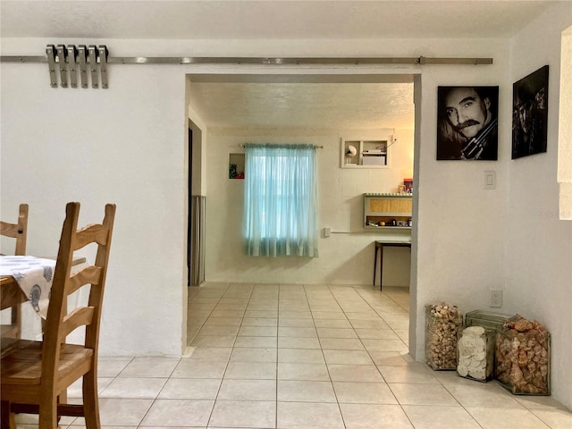 232 Darst Ave, Punta Gorda, FL 33950 - corridor with light tile patterned flooring