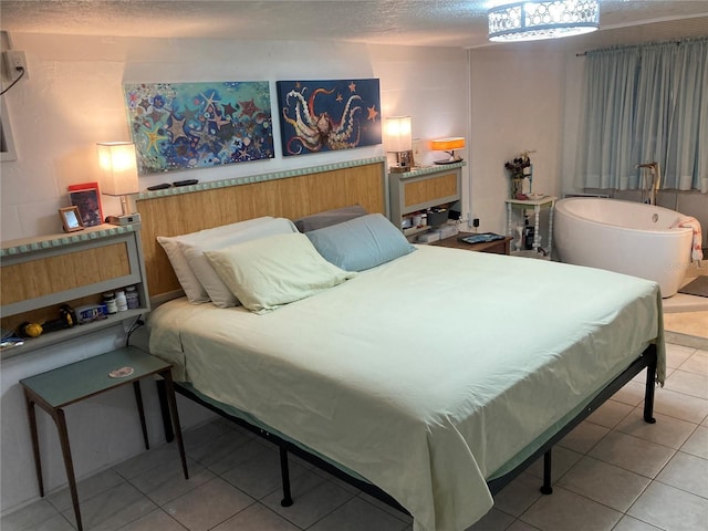 232 Darst Ave, Punta Gorda, FL 33950 - bedroom with tile patterned floors and a textured ceiling