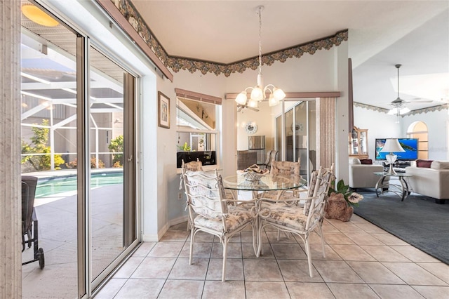 574 Macedonia Dr, Punta Gorda, FL 33950 - dining space with plenty of natural light, light tile patterned floors, a chandelier, and a ceiling fan