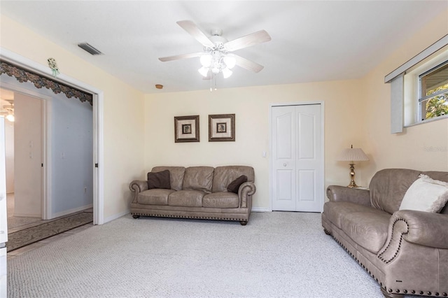 574 Macedonia Dr, Punta Gorda, FL 33950 - carpeted living area featuring a ceiling fan and baseboards
