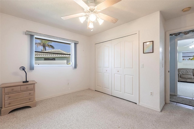 574 Macedonia Dr, Punta Gorda, FL 33950 - unfurnished bedroom featuring carpet flooring, a closet, and a ceiling fan