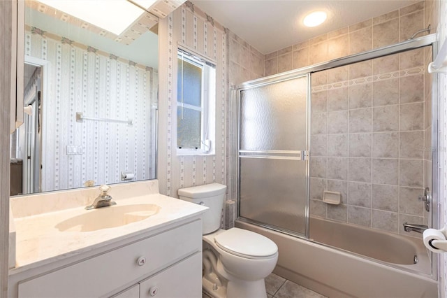 574 Macedonia Dr, Punta Gorda, FL 33950 - full bathroom featuring vanity, tile patterned flooring, enclosed tub / shower combo, and wallpapered walls